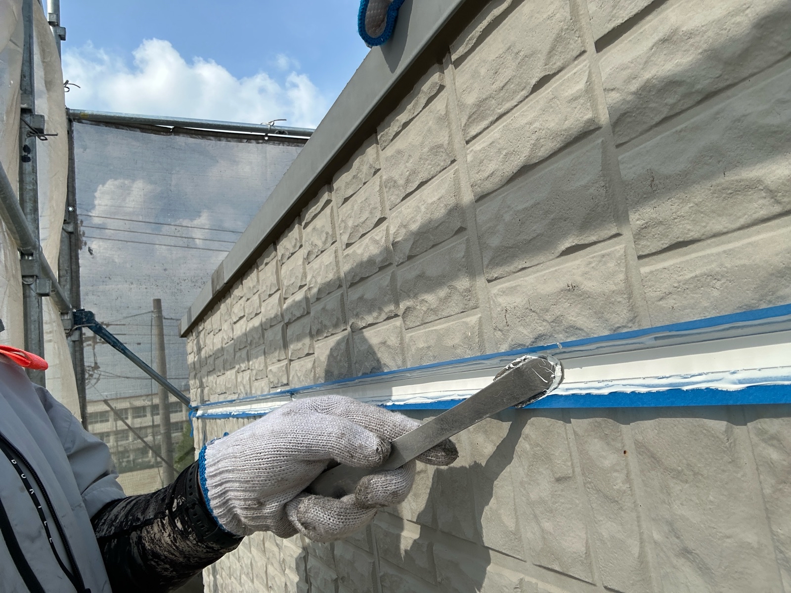 コーキング材ならし作業